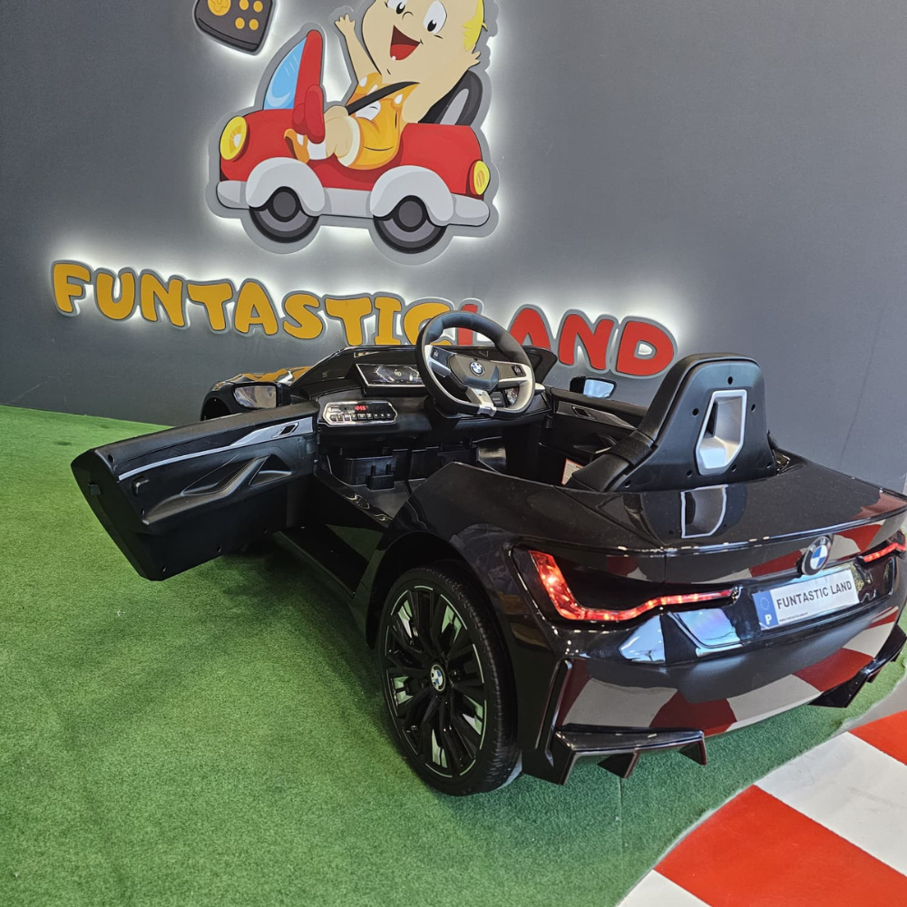 Carro Elétrico para Criança BMW I4 12v Preto c/ RODAS DE BORRACHA & ASSENTO EM PELE