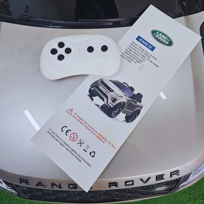 Carro Elétrico para Criança RANGE ROVER EVOQUE 12v Cinza Metalizado c/ RODAS DE BORRACHA E ASSENTO EM PELE