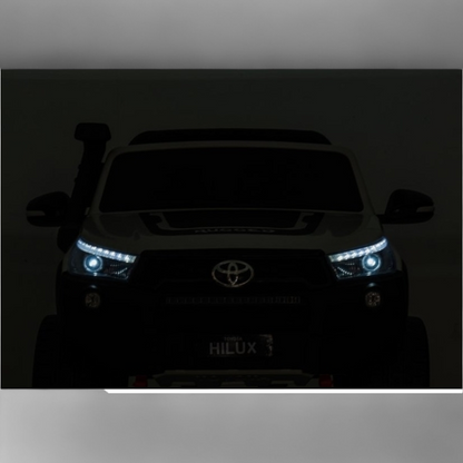 Carro Elétrico para Criança Toyota Hilux Azul Metalizado 12v 4x4 c/ Rodas de Borracha & Assento em Pele