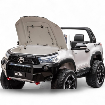 Carro Elétrico para Criança Toyota Hilux Branco 12v 4x4 c/ Rodas de Borracha & Assento em Pele