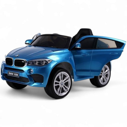 Carro Elétrico para Criança BMW X6M 12v Azul Metalizado c/ RODAS DE BORRACHA & ASSENTO EM PELE