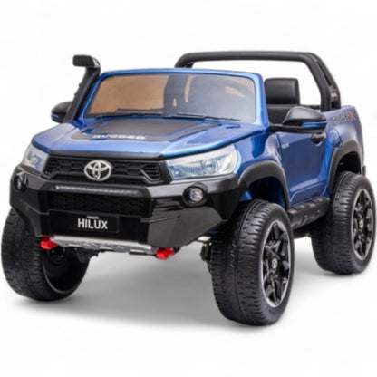 Carro Elétrico para Criança Toyota Hilux Azul Metalizado 12v 4x4 c/ Rodas de Borracha & Assento em Pele