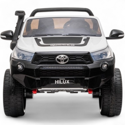 Carro Elétrico para Criança Toyota Hilux Branco 12v 4x4 c/ Rodas de Borracha & Assento em Pele
