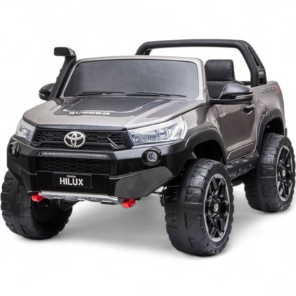 Carro Elétrico para Criança Toyota Hilux Cinza Metalizado 12v 4x4 c/ Rodas de Borracha & Assento em Pele